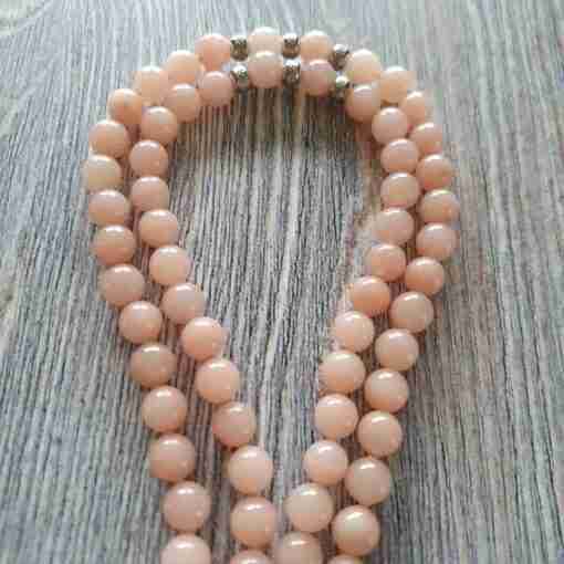 Rosafarbene Aventurinquarz-Mala mit rosa-orangefarbenem Skolezit – Bild 9