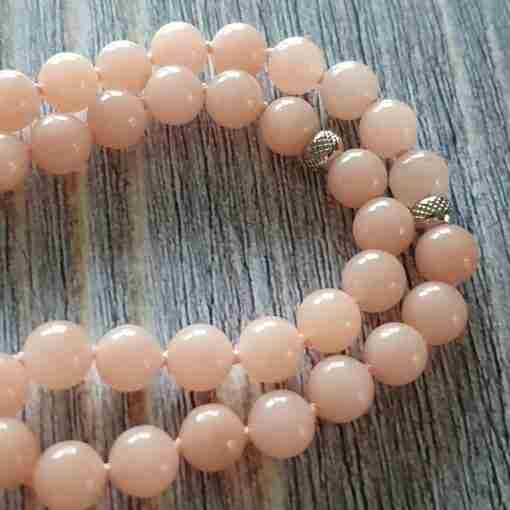 Rosafarbene Aventurinquarz-Mala mit rosa-orangefarbenem Skolezit – Bild 13