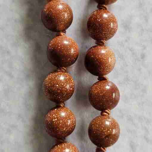Goldfluss-Bergkristall (facettiert) -Mala (2) mit Goldfluss-Donut und Armband – Bild 21