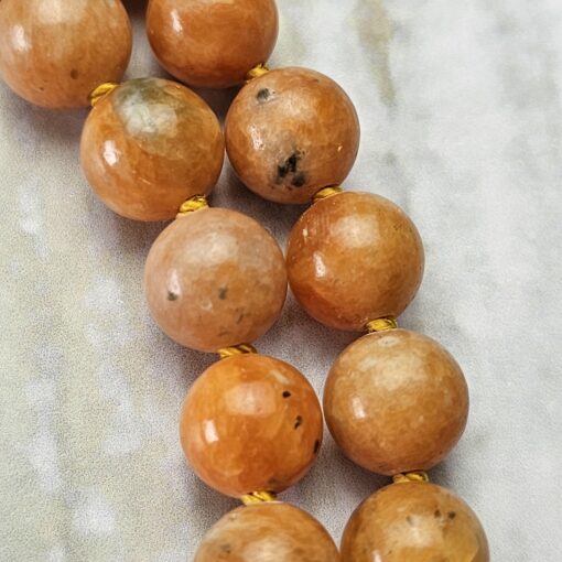 Calcit (orangefarben und gelb) -Kupfer-Mala mit gelbem Calcit-Donut – Bild 18