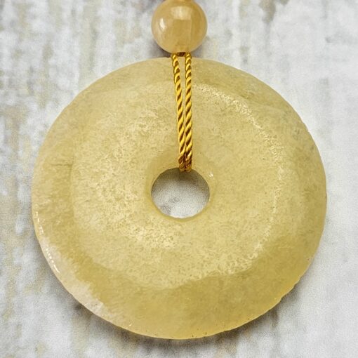 Calcit (orangefarben und gelb) -Kupfer-Mala mit gelbem Calcit-Donut – Bild 8