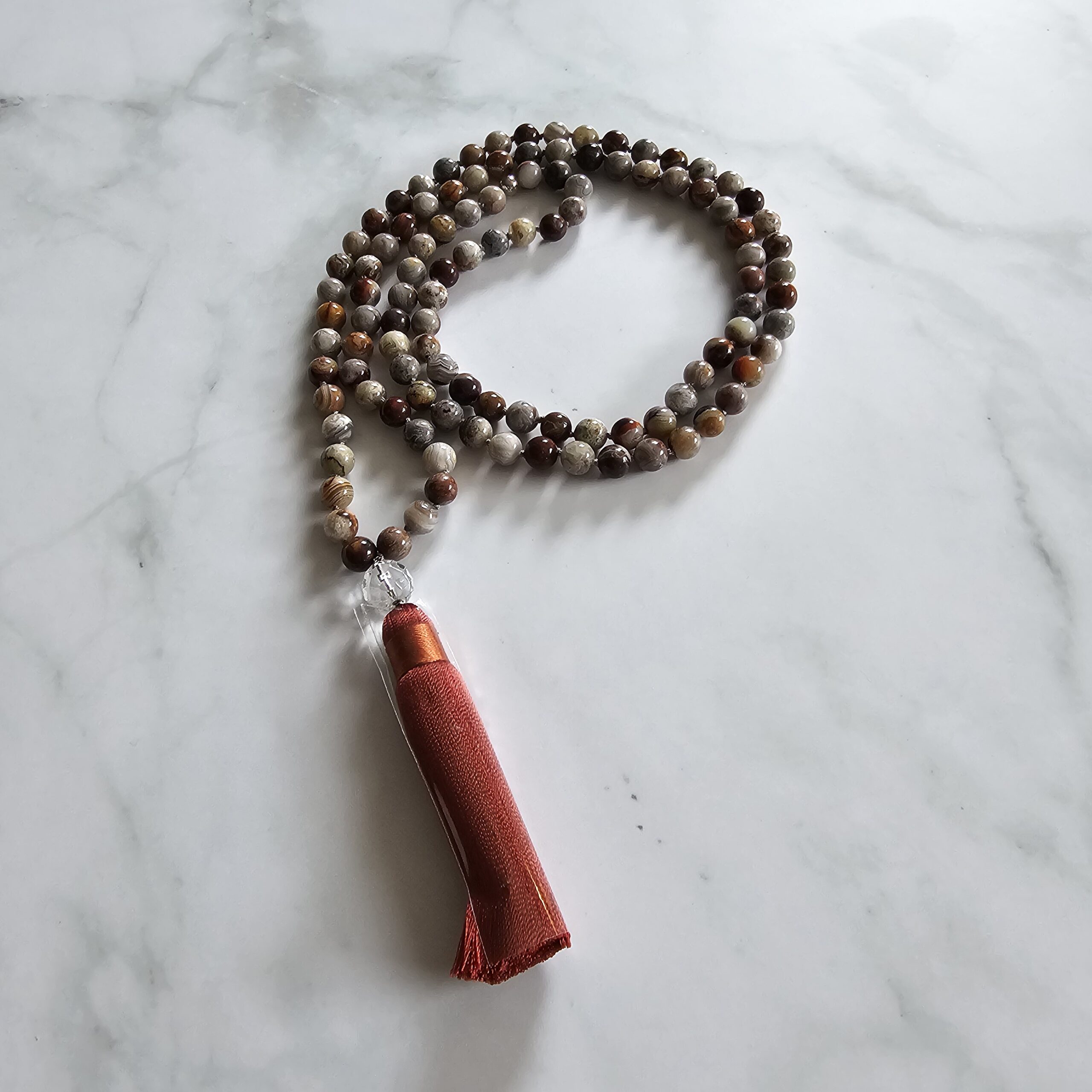 Achat („Crazy Lace“ Achat) -Mala (1) mit Seidenquaste