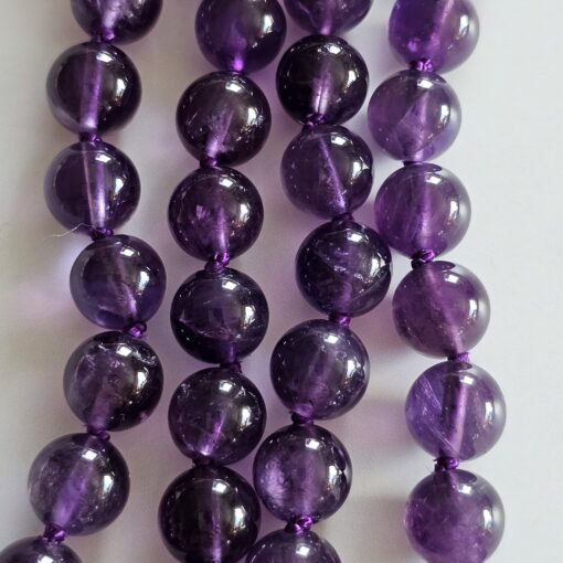Amethyst-Mala, dunkel sowie etwas heller und facettiert, mit Edelstahlanhänger und Armband – Bild 2