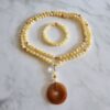 Calcit (gelb) -Kupfer-Mala mit orangefarbenem Aventurinquarz-Donut und Armband