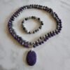 Charoit-"Adlerauge"-Mala mit Charoit-Anhänger und Armband
