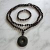 Granat (Malaya-Granat, facettiert) -Mala mit Eklogit-Donut und Armband